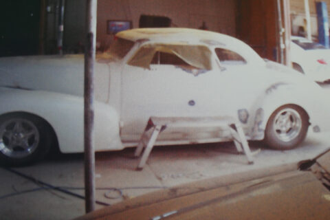Older Style Car with White Body Paint Ready to Be Repainted